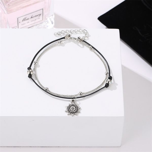 fashion and personality retro national wind women's weaving black lanyard alloy sun pendant double layer anklet, Red;blue
fashion and personality retro national wind women's weaving black lanyard alloy sun pendant double layer anklet, Red;blue