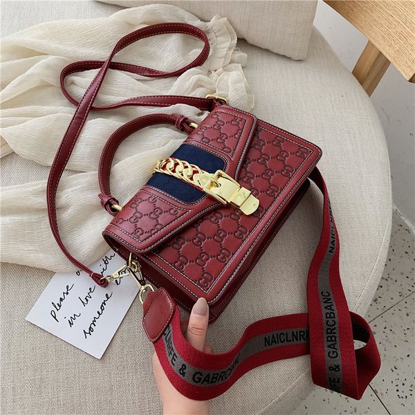 ladies shoulder bag new autumn and winter embossed wide shoulder strap diagonal bag fashion simple handbag small square
ladies shoulder bag new autumn and winter embossed wide shoulder strap diagonal bag fashion simple handbag small square