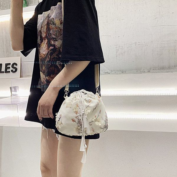 women fashion bag sweet personalized drawstring shoulder bag creative floral printed tassels shoulder new
women fashion bag sweet personalized drawstring shoulder bag creative floral printed tassels shoulder new