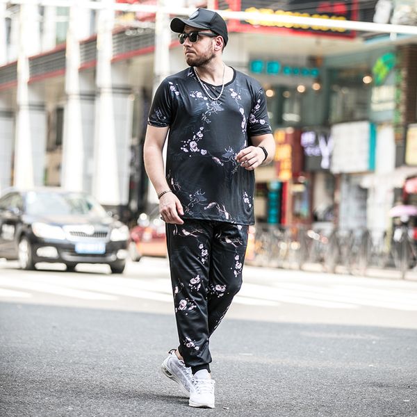 new fashion designer men's tracksuits sets for summer men's t shirts and long pants with hip hop rapper tracksuits sets size -7xl, Gray 
new fashion designer men's tracksuits sets for summer men's t shirts and long pants with hip hop rapper tracksuits sets size -7xl, Gray