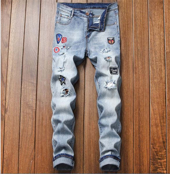 designer mens jeans fashion slim embroidery pencil pants mens casual hole trousers, Blue
designer mens jeans fashion slim embroidery pencil pants mens casual hole trousers, Blue