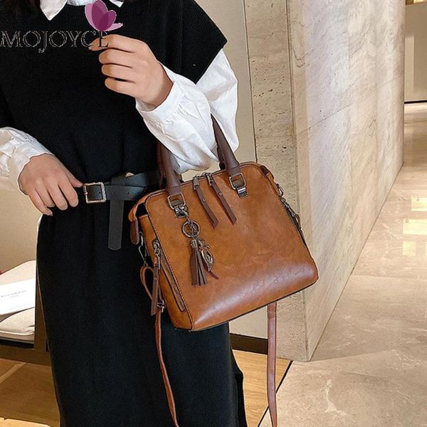 fashion female solid color messenger handle bag women pu leather purse tassel pendant shoulder handbag
fashion female solid color messenger handle bag women pu leather purse tassel pendant shoulder handbag