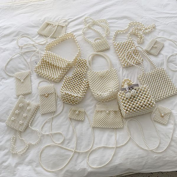fashion new mini pearl bag 2020 retro women bag beaded dinner lady handbag shoulder messenger
fashion new mini pearl bag 2020 retro women bag beaded dinner lady handbag shoulder messenger