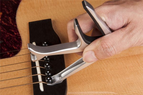 joyo jcp-02 durable silver metal 3 in 1 multifunction guitar capo bottle opener guitar bridge pins puller&joyo jazz guitar picks
joyo jcp-02 durable silver metal 3 in 1 multifunction guitar capo bottle opener guitar bridge pins puller&joyo jazz guitar picks