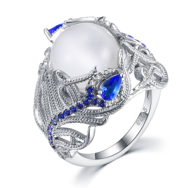 2019 new fashion blue zircon flower moonstone ring women's european creative retro feather ring wedding jewelry gift anel, Silver
2019 new fashion blue zircon flower moonstone ring women's european creative retro feather ring wedding jewelry gift anel, Silver