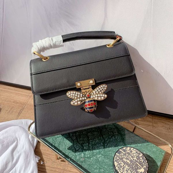 the new 2020 ms color single genuine leather handbag shoulder bucket bags woman portable oblique satchel girls women the designer handbags
the new 2020 ms color single genuine leather handbag shoulder bucket bags woman portable oblique satchel girls women the designer handbags