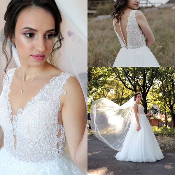 romantic 2020 v neck tulle a line bridal wedding gowns sleeveless covered button floor length wedding dresses with lace beads, White
romantic 2020 v neck tulle a line bridal wedding gowns sleeveless covered button floor length wedding dresses with lace beads, White