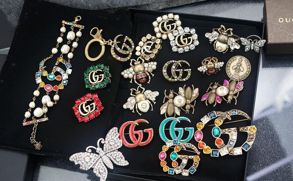 celebrity design letter pearl diamond brooch decorations fashion metal letter bee brooch jewelry withoff, Gray
celebrity design letter pearl diamond brooch decorations fashion metal letter bee brooch jewelry withoff, Gray