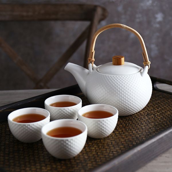 classic tetsubin design porcelain tea set with 1 teapot 4 tea cups for loose leaf flower tea matte white green with relief dots
classic tetsubin design porcelain tea set with 1 teapot 4 tea cups for loose leaf flower tea matte white green with relief dots