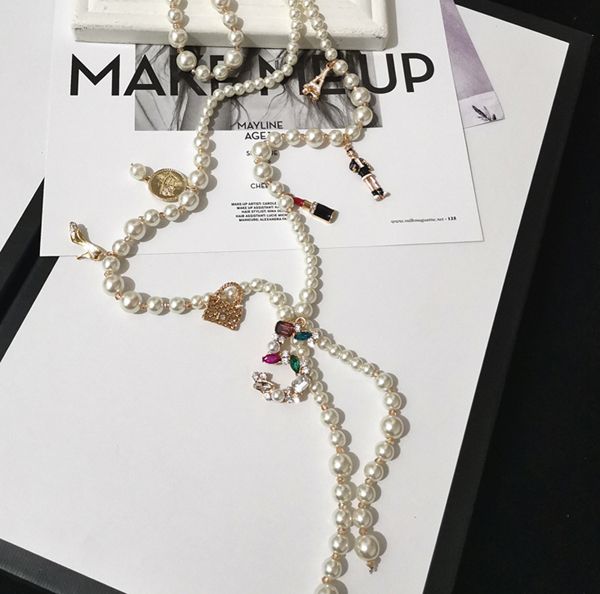 long simulated pearl necklace for women no.5 pendant long necklace trendy design style pearl tassel, Golden;silver
long simulated pearl necklace for women no.5 pendant long necklace trendy design style pearl tassel, Golden;silver