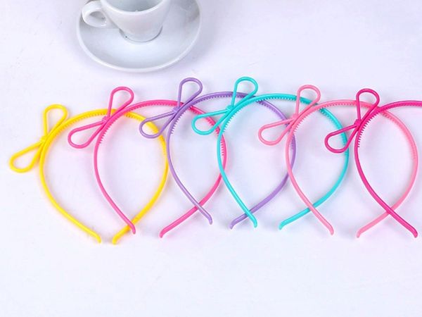 50 mixed color plastic bows hair tiara princess headband hair band with teeth, Golden;white 
50 mixed color plastic bows hair tiara princess headband hair band with teeth, Golden;white