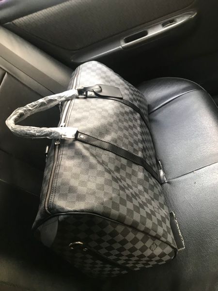 2020 men duffle bag women travel bags hand luggage luxury designer travel bag men pu leather handbags large cross body bag totes
2020 men duffle bag women travel bags hand luggage luxury designer travel bag men pu leather handbags large cross body bag totes