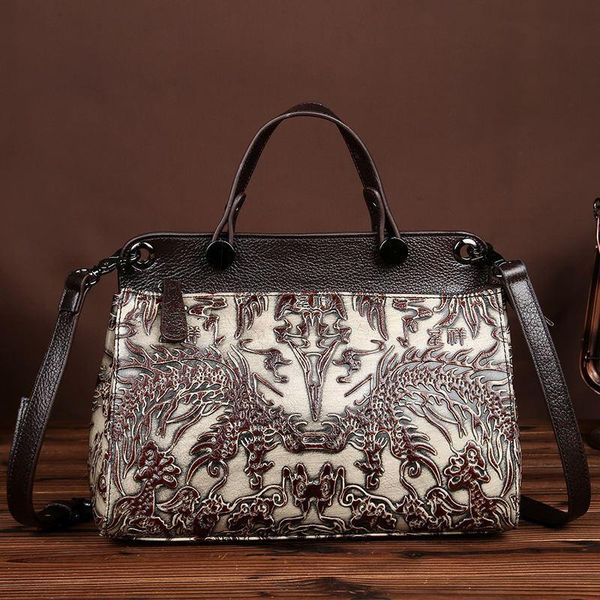 the new leather ladies bag and retro head layer cowhide bag hand brush color satchel
the new leather ladies bag and retro head layer cowhide bag hand brush color satchel