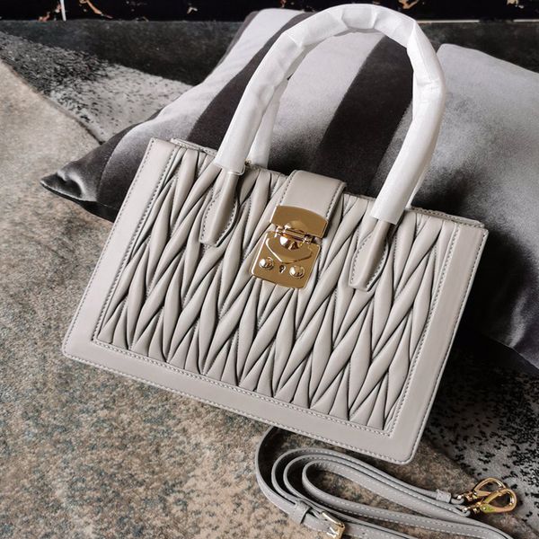 bags imported lambskin leather material matelasse classic pattern steel metal accessories middle zipper center compartments bag
bags imported lambskin leather material matelasse classic pattern steel metal accessories middle zipper center compartments bag