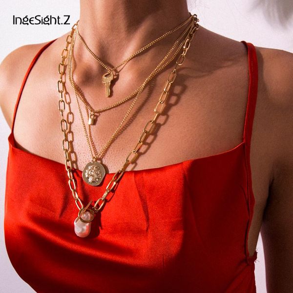 ingesight.z bohemia multi layer imitation pearl choker necklace collar statement lock carved coin pendant necklace women jewelry, Silver
ingesight.z bohemia multi layer imitation pearl choker necklace collar statement lock carved coin pendant necklace women jewelry, Silver