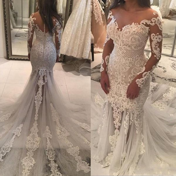 New Sexy Mermaid Wedding Dresses Sheer Neckline Lace Appliques Pearls Beaded Illusion Long Sleeves See Through Tulle Plus Size Bridal Gowns
New Sexy Mermaid Wedding Dresses Sheer Neckline Lace Appliques Pearls Beaded Illusion Long Sleeves See Through Tulle Plus Size Bridal Gowns