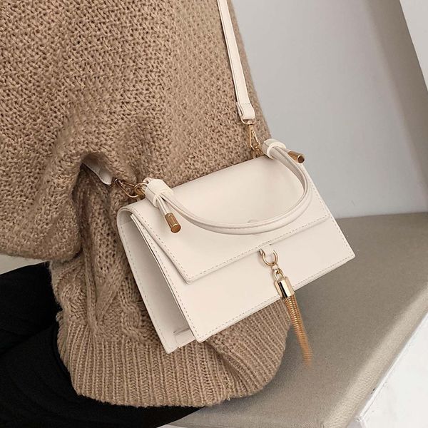 elegant female solid color tote bag 2020 fashion new quality pu leather women's designer handbag tassel shoulder messenger bag
elegant female solid color tote bag 2020 fashion new quality pu leather women's designer handbag tassel shoulder messenger bag