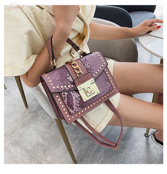 womens fashion pu leather female rivets metal lock bag shoulder strap bag messenger small square package 2020 new
womens fashion pu leather female rivets metal lock bag shoulder strap bag messenger small square package 2020 new