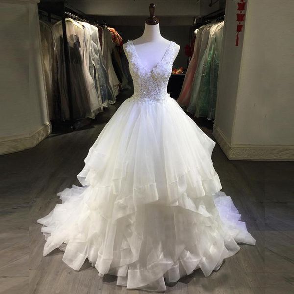 Betra Lace Applique A-Line Wedding Dresses With Sash Sheer Illusion Long Sleeve Ivory Elegant Bridal Gowns Backless Sexy Wedding Vestidos