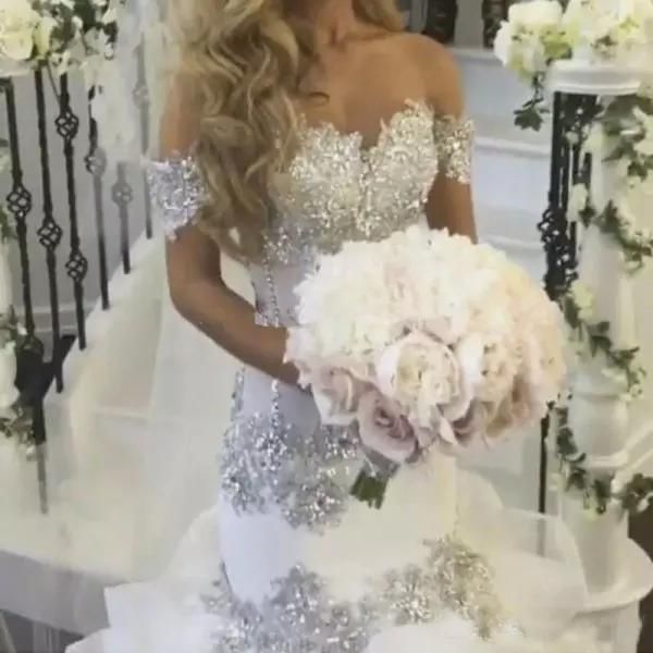 off shoulder illusion mermaid wedding dress sparkly beaded crystals silver lace appliques bridal gowns ruffled beach wedding dress, White
off shoulder illusion mermaid wedding dress sparkly beaded crystals silver lace appliques bridal gowns ruffled beach wedding dress, White