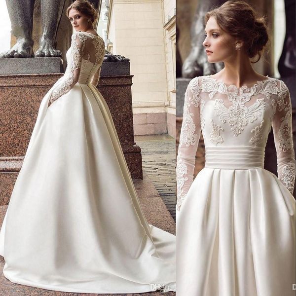new middle east a line wedding dresses jewel neck lace appliques illusion button back sweep train plus size custom bridal gowns, White
new middle east a line wedding dresses jewel neck lace appliques illusion button back sweep train plus size custom bridal gowns, White