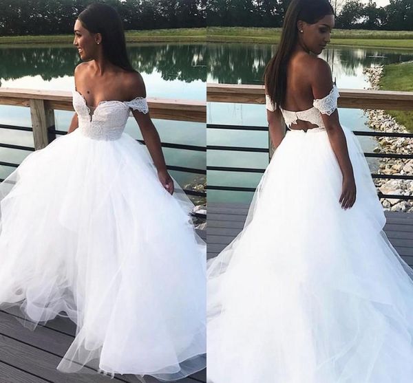 пляж свадебные платья hollow back off плеча с коротким рукавом кружева топ тюль юбка boho свадебные платья линия vestidos de noiva b2, White
пляж свадебные платья hollow back off плеча с коротким рукавом кружева топ тюль юбка boho свадебные платья линия vestidos de noiva b2, White