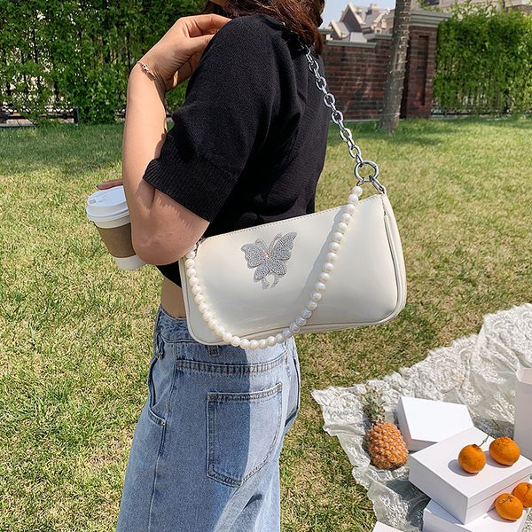 2020 new fashion women's small bag bright skin baguette girl messenger shoulder bag chain beading zipper female vintage handbag
2020 new fashion women's small bag bright skin baguette girl messenger shoulder bag chain beading zipper female vintage handbag