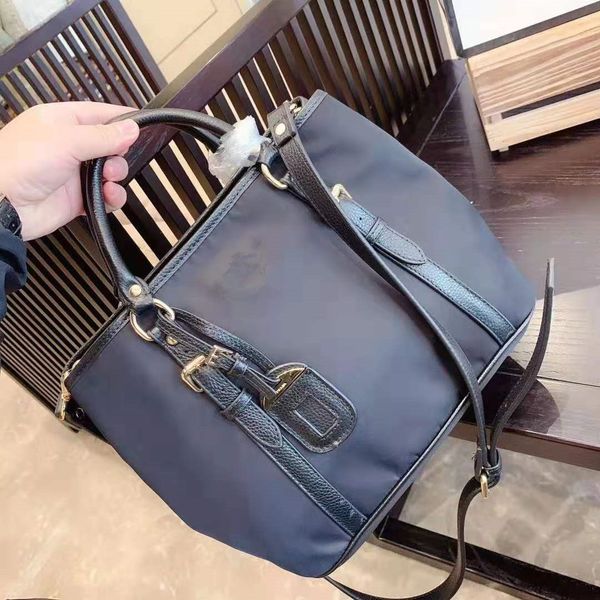 fashion contracted handbag waterproof nylon fabric with cow leather lady single shoulder bag purses totes female package
fashion contracted handbag waterproof nylon fabric with cow leather lady single shoulder bag purses totes female package