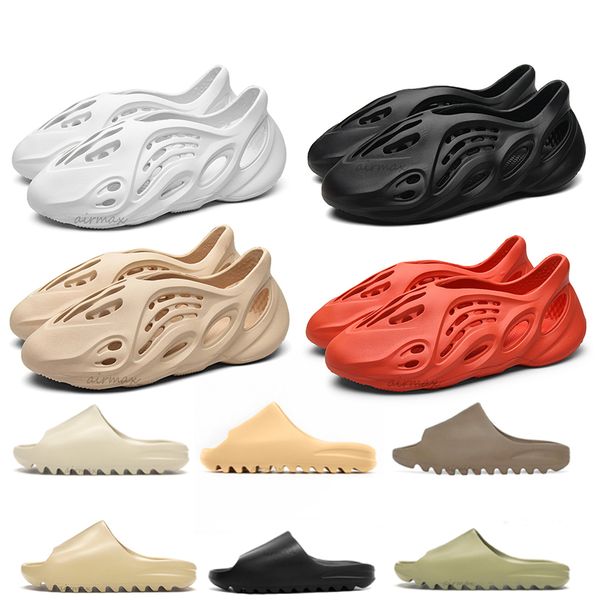 2020 kanye west soot slipper men women bone earth brown desert sand slide resin core stylist shoes sandals triple black foam runner
2020 kanye west soot slipper men women bone earth brown desert sand slide resin core stylist shoes sandals triple black foam runner