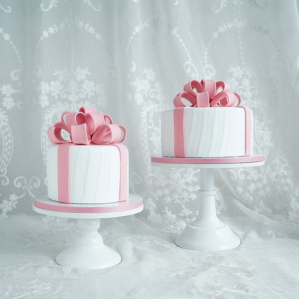 simulation fondant cake ribbon master cake food pgraphy props background cake shop window display
simulation fondant cake ribbon master cake food pgraphy props background cake shop window display