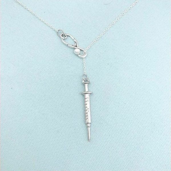 ancient silver stethoscope syringe charm pendant necklace creative designer necklace couple jewelry doctor nurse medical rescue gift
ancient silver stethoscope syringe charm pendant necklace creative designer necklace couple jewelry doctor nurse medical rescue gift