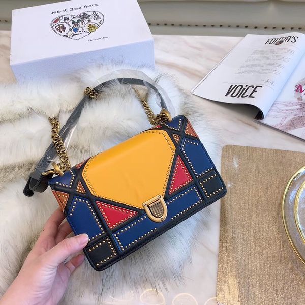 the est brand ladies color matching rivets small square bag designer lock chain handbags fashion single shoulder diagonal bag
the est brand ladies color matching rivets small square bag designer lock chain handbags fashion single shoulder diagonal bag