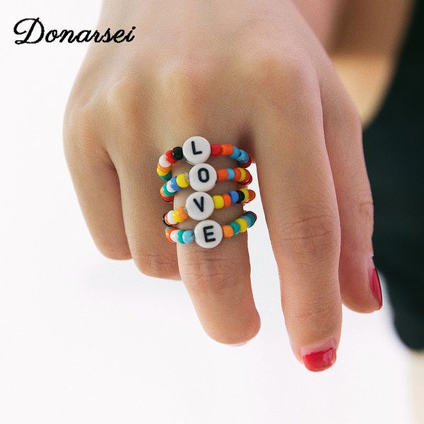 donarsei 4шт / комплект мода письмо любовного бисера кольцо для женщин регулируемых ручных красочных шариков перстней партии, Golden;silver 
donarsei 4шт / комплект мода письмо любовного бисера кольцо для женщин регулируемых ручных красочных шариков перстней партии, Golden;silver