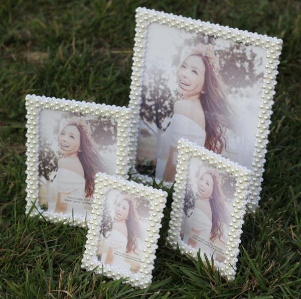 50pcs european pearl diamond decoration p frame 7 inch rectangle p frames wedding decorations picture frame sn1723
50pcs european pearl diamond decoration p frame 7 inch rectangle p frames wedding decorations picture frame sn1723
