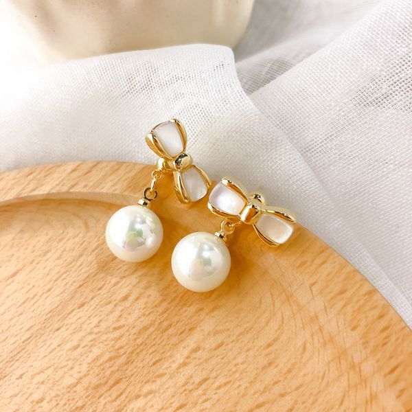 2020 new simple sweet cute silver pin bow imitation pearl shell drop earrings for women girl fashion jewelry accessories
2020 new simple sweet cute silver pin bow imitation pearl shell drop earrings for women girl fashion jewelry accessories