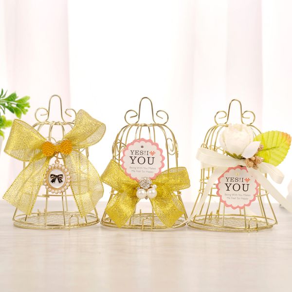 10pcs / lot golden tinplate bird cage bell candy box romantic wrought iron wedding gifts boxes party birthday decor supplies
10pcs / lot golden tinplate bird cage bell candy box romantic wrought iron wedding gifts boxes party birthday decor supplies