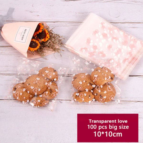 100pcs/lot self adhesive packaging bag transparent pink love openwork love soap homemade biscuits birthday party gift bag
100pcs/lot self adhesive packaging bag transparent pink love openwork love soap homemade biscuits birthday party gift bag