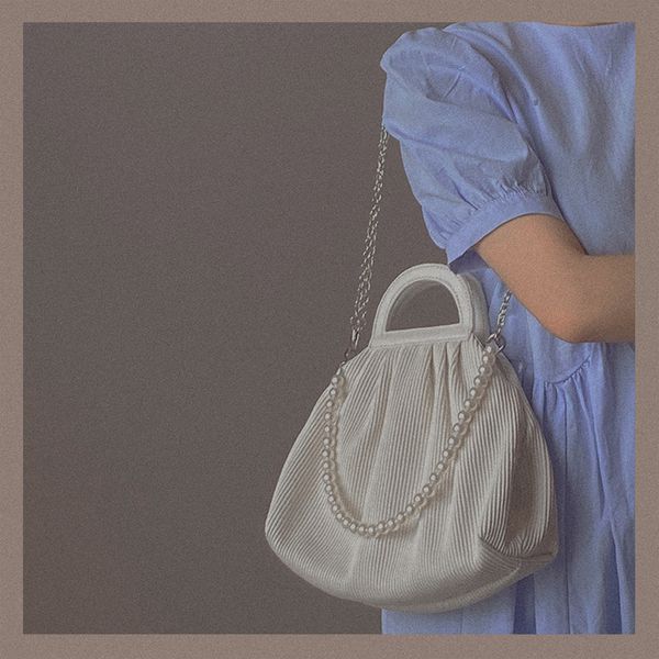 elegant female chain tote bag fashion new quality pearl shoulder strap women's handbag pleated shoulder messenger bag armpit
elegant female chain tote bag fashion new quality pearl shoulder strap women's handbag pleated shoulder messenger bag armpit