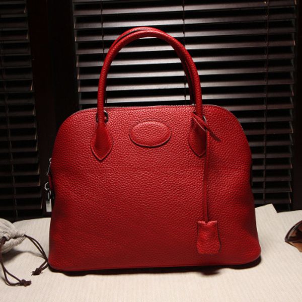 2015 new 100% genuine leather women bag original leather togo embossed handbag bollywood bag shell
2015 new 100% genuine leather women bag original leather togo embossed handbag bollywood bag shell
