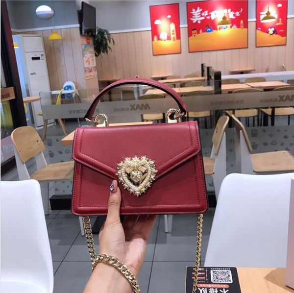 classic genuine leather handbag new printing presbyopic one shoulder bucket bags woman hand his messenger bag joker the designer handbags 36
classic genuine leather handbag new printing presbyopic one shoulder bucket bags woman hand his messenger bag joker the designer handbags 36