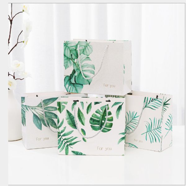 5pcs/lot arrived fashion design shopping bags paperboard storage&gift bags package portable hand rope high-quality 
5pcs/lot arrived fashion design shopping bags paperboard storage&gift bags package portable hand rope high-quality