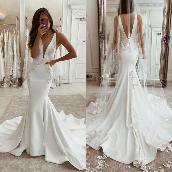 simple white v neck wedding dresses backless sleeveless sweep train mermaid vestido de novia beach bridal gowns with appliques lace
simple white v neck wedding dresses backless sleeveless sweep train mermaid vestido de novia beach bridal gowns with appliques lace