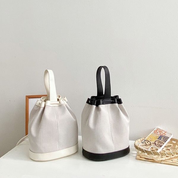 2020 ins new women small handbags female canvas pu drawstring round bucket bag japan style ladies crossbody shoulder bag
2020 ins new women small handbags female canvas pu drawstring round bucket bag japan style ladies crossbody shoulder bag