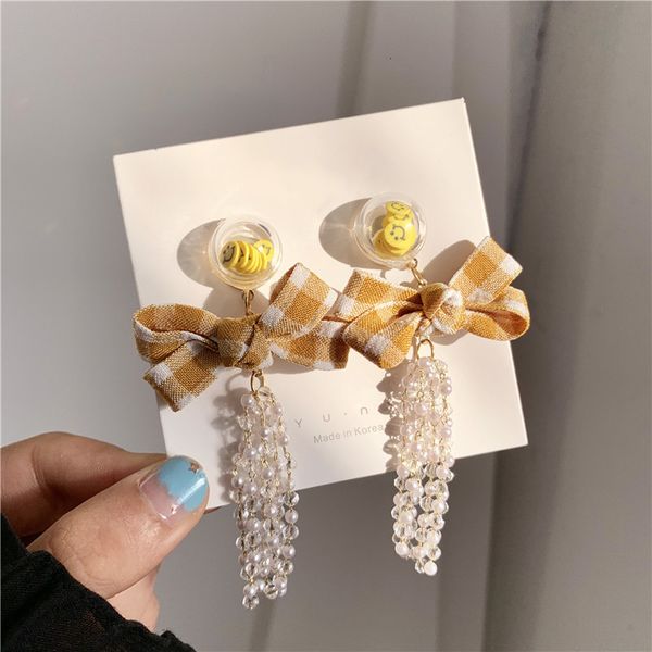 cute fashion yellow bowknot dangle earrings pearl bow long fringed earrings smile drop for woman girls, Silver
cute fashion yellow bowknot dangle earrings pearl bow long fringed earrings smile drop for woman girls, Silver