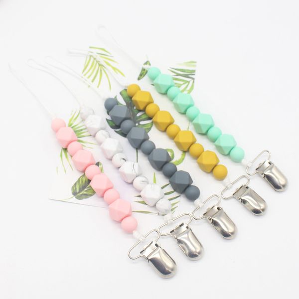 dhl 100pcs silicone teething pacifier clips with safe abs beads silicone pacifier chain holder for nipples baby chew toys
dhl 100pcs silicone teething pacifier clips with safe abs beads silicone pacifier chain holder for nipples baby chew toys
