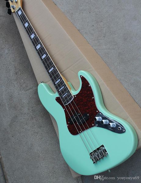 green electric bass guitar with red tortoiseshell, rosewood scales, 4 strings, 20 sounds, personalized service
green electric bass guitar with red tortoiseshell, rosewood scales, 4 strings, 20 sounds, personalized service