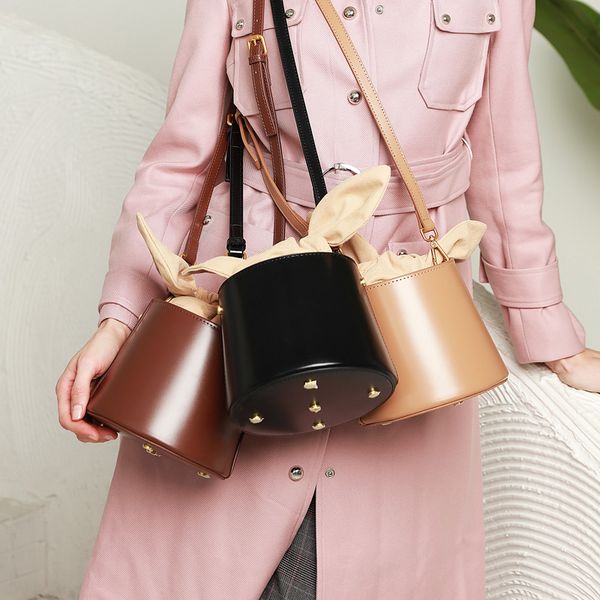 new women's designer luxury handbags purses niche design fashion leather bucket bag bow shoulder bag portable messenger bag 9009
new women's designer luxury handbags purses niche design fashion leather bucket bag bow shoulder bag portable messenger bag 9009
