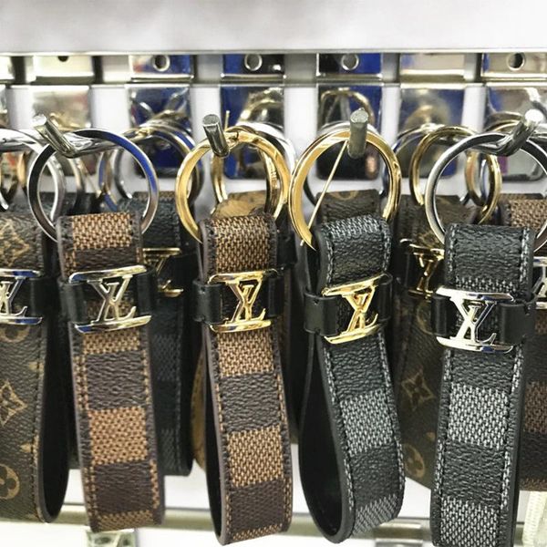 leather keychain lanyard luxury designer car keychain accessories pendant vintage universal eight colors lattice fashion business, Silver
leather keychain lanyard luxury designer car keychain accessories pendant vintage universal eight colors lattice fashion business, Silver