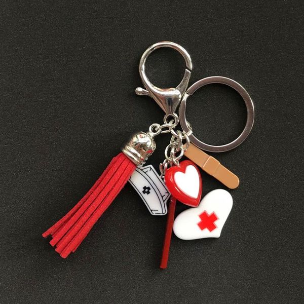 1pc personality women keychain fasion red cross set multicolor flatback rresin charms handbag keyring with tassel keyring, Silver 
1pc personality women keychain fasion red cross set multicolor flatback rresin charms handbag keyring with tassel keyring, Silver