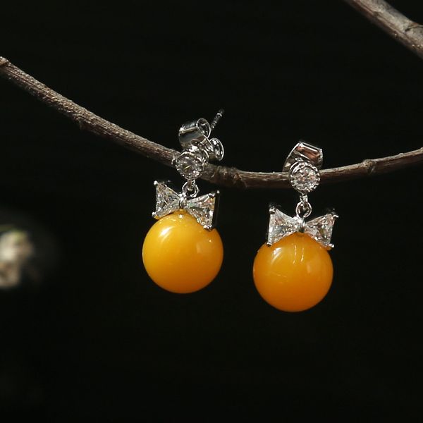 stylist hand made of natural semi-precious stones yellow bow candy is fashionable chic new earrings, Golden;silver
stylist hand made of natural semi-precious stones yellow bow candy is fashionable chic new earrings, Golden;silver